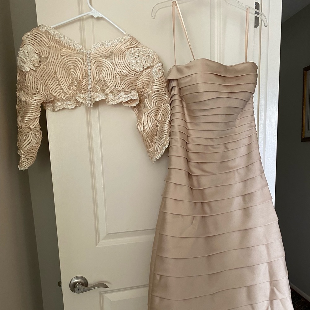 Vera Wang strapless dressCan be worn two ways with balero or strapless. Size 4.